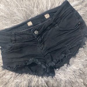 Brandy Melville Black Denim Cut off shorts. Tag- Size 38.